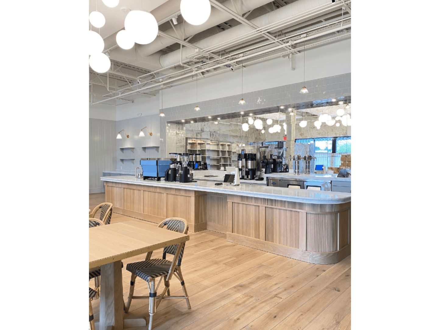 Le Bar European oak hardwood flooring installed | Mill & Woods